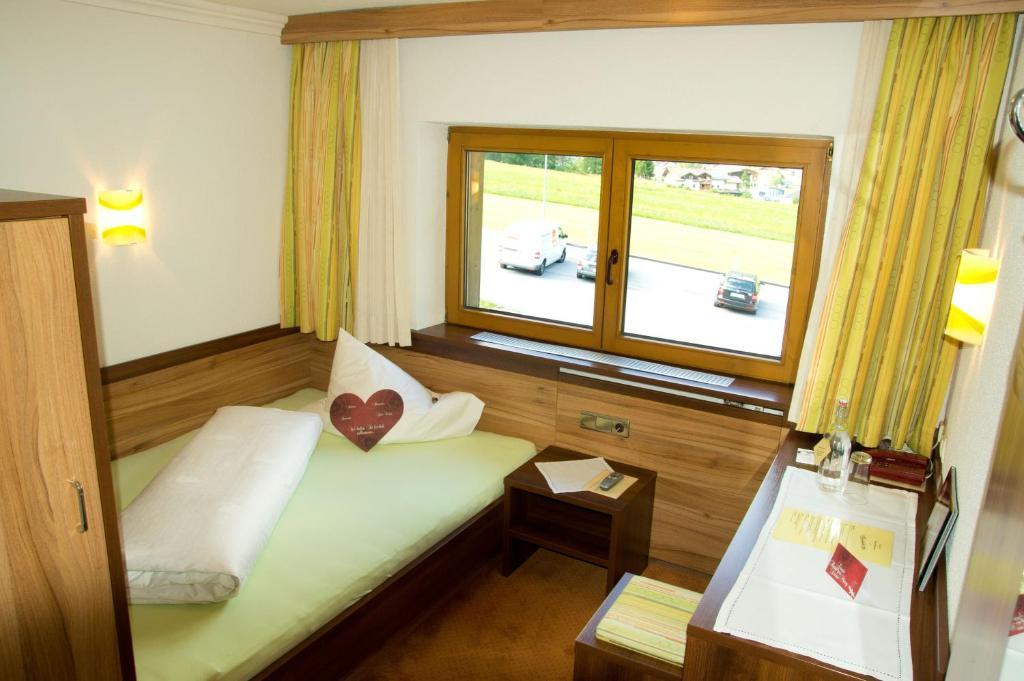 Hotel Garni Hainbacherhof Зельден Номер фото